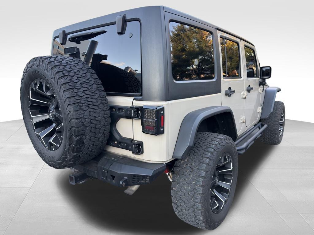 used 2016 Jeep Wrangler Unlimited car, priced at $16,980