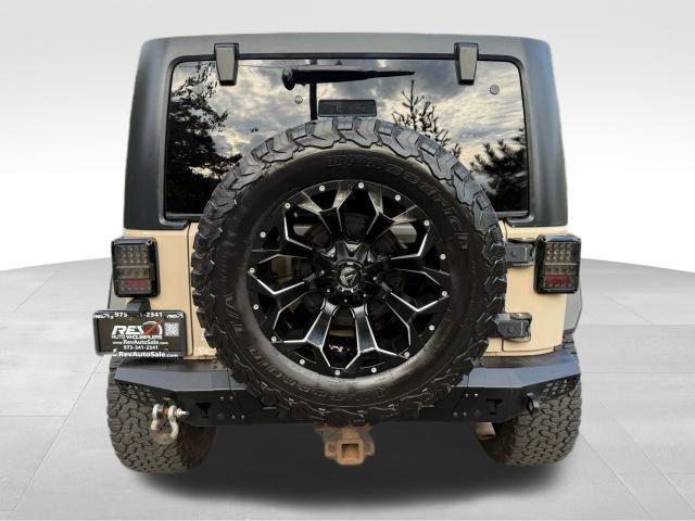 used 2016 Jeep Wrangler Unlimited car, priced at $18,480