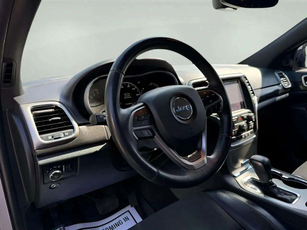 used 2018 Jeep Grand Cherokee car, priced at $13,864