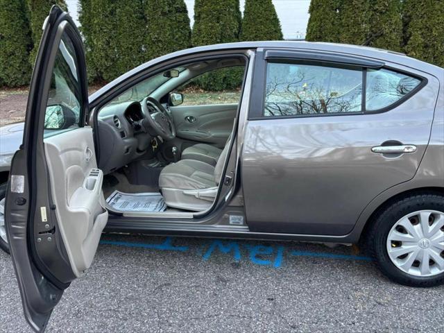 used 2016 Nissan Versa car, priced at $5,980