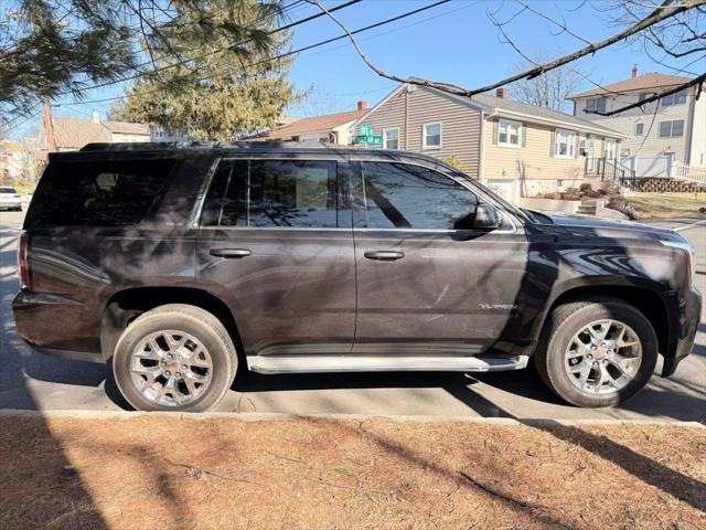 used 2015 GMC Yukon car, priced at $13,880