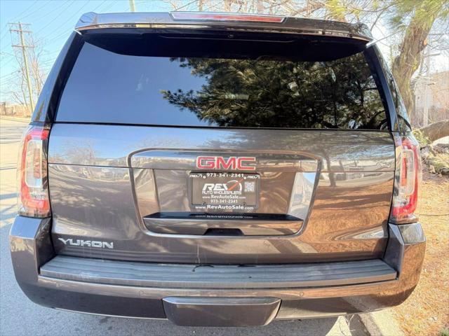 used 2015 GMC Yukon car, priced at $13,880