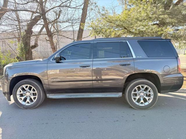 used 2015 GMC Yukon car, priced at $13,880