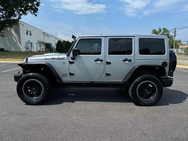 used 2014 Jeep Wrangler Unlimited car, priced at $18,495