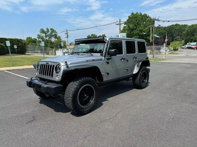 used 2014 Jeep Wrangler Unlimited car, priced at $18,495