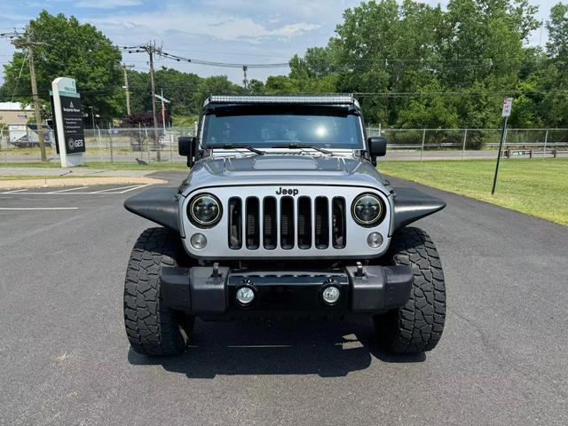 used 2014 Jeep Wrangler Unlimited car, priced at $18,495