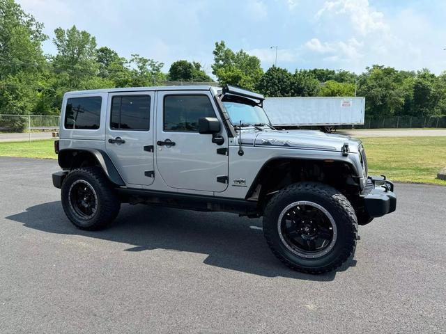 used 2014 Jeep Wrangler Unlimited car, priced at $18,495