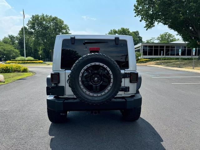 used 2014 Jeep Wrangler Unlimited car, priced at $18,495