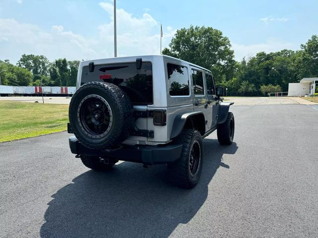 used 2014 Jeep Wrangler Unlimited car, priced at $18,495