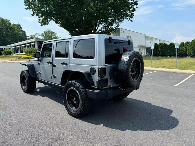 used 2014 Jeep Wrangler Unlimited car, priced at $18,495