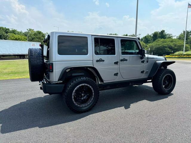 used 2014 Jeep Wrangler Unlimited car, priced at $18,495