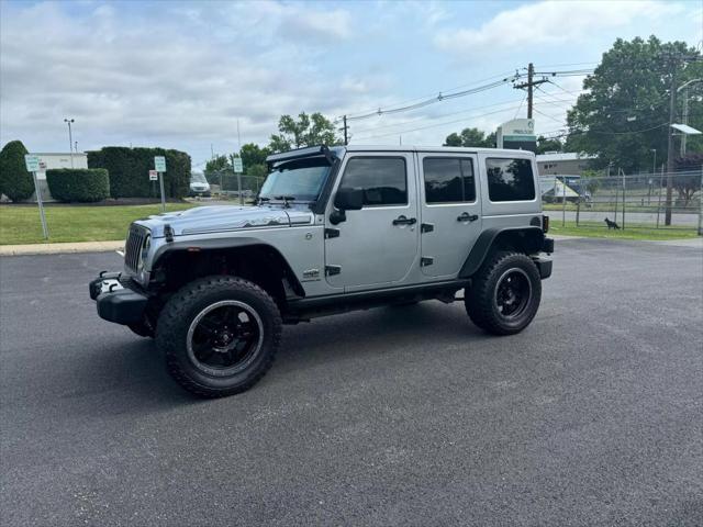 used 2014 Jeep Wrangler Unlimited car, priced at $16,890