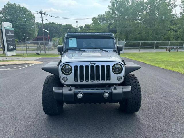 used 2014 Jeep Wrangler Unlimited car, priced at $16,890