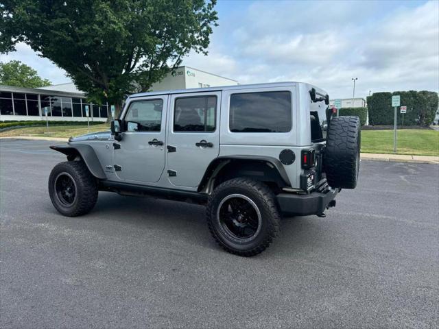 used 2014 Jeep Wrangler Unlimited car, priced at $16,890