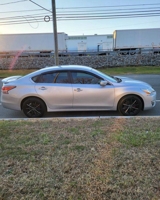 used 2015 Nissan Altima car, priced at $5,680