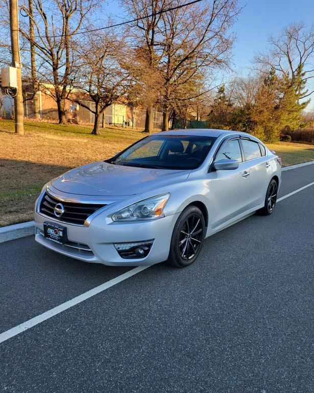 used 2015 Nissan Altima car, priced at $6,980