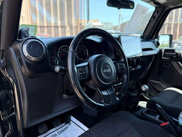 used 2012 Jeep Wrangler Unlimited car, priced at $9,980