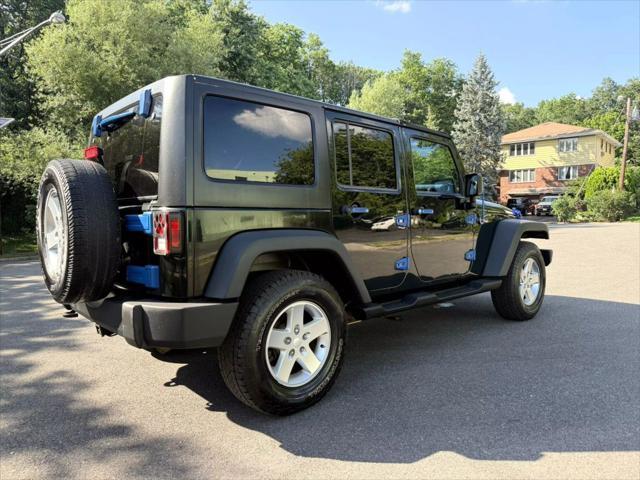 used 2012 Jeep Wrangler Unlimited car, priced at $10,880