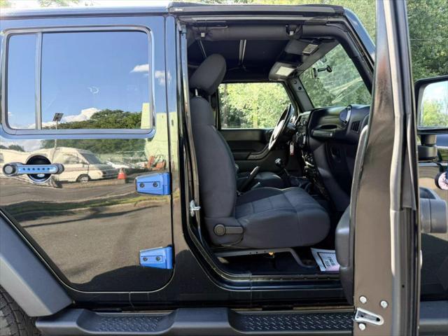used 2012 Jeep Wrangler Unlimited car, priced at $10,880