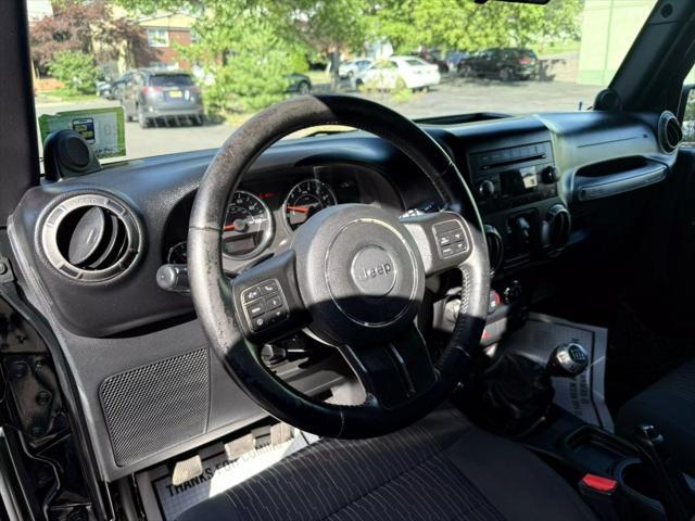 used 2012 Jeep Wrangler Unlimited car, priced at $10,880