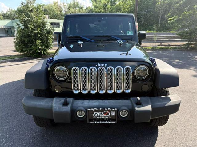 used 2012 Jeep Wrangler Unlimited car, priced at $10,880