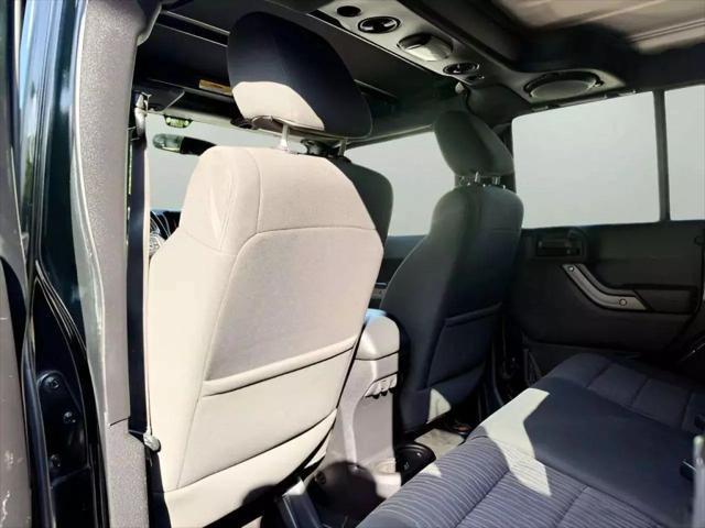 used 2012 Jeep Wrangler Unlimited car, priced at $9,980