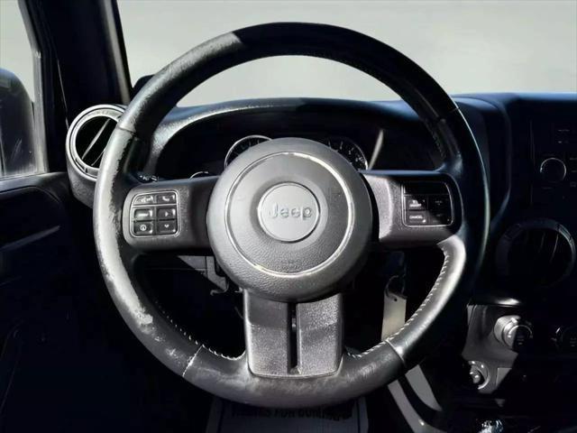 used 2012 Jeep Wrangler Unlimited car, priced at $9,980