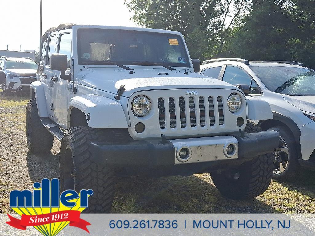 used 2015 Jeep Wrangler Unlimited car, priced at $18,990