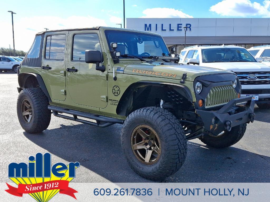 used 2013 Jeep Wrangler Unlimited car, priced at $19,690