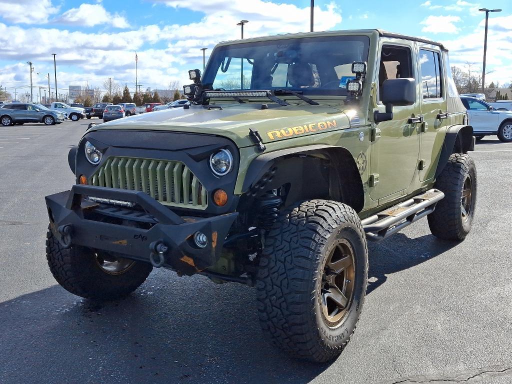 used 2013 Jeep Wrangler Unlimited car, priced at $19,690