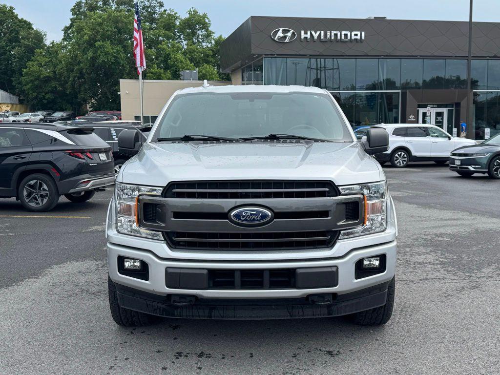 used 2018 Ford F-150 car, priced at $30,499