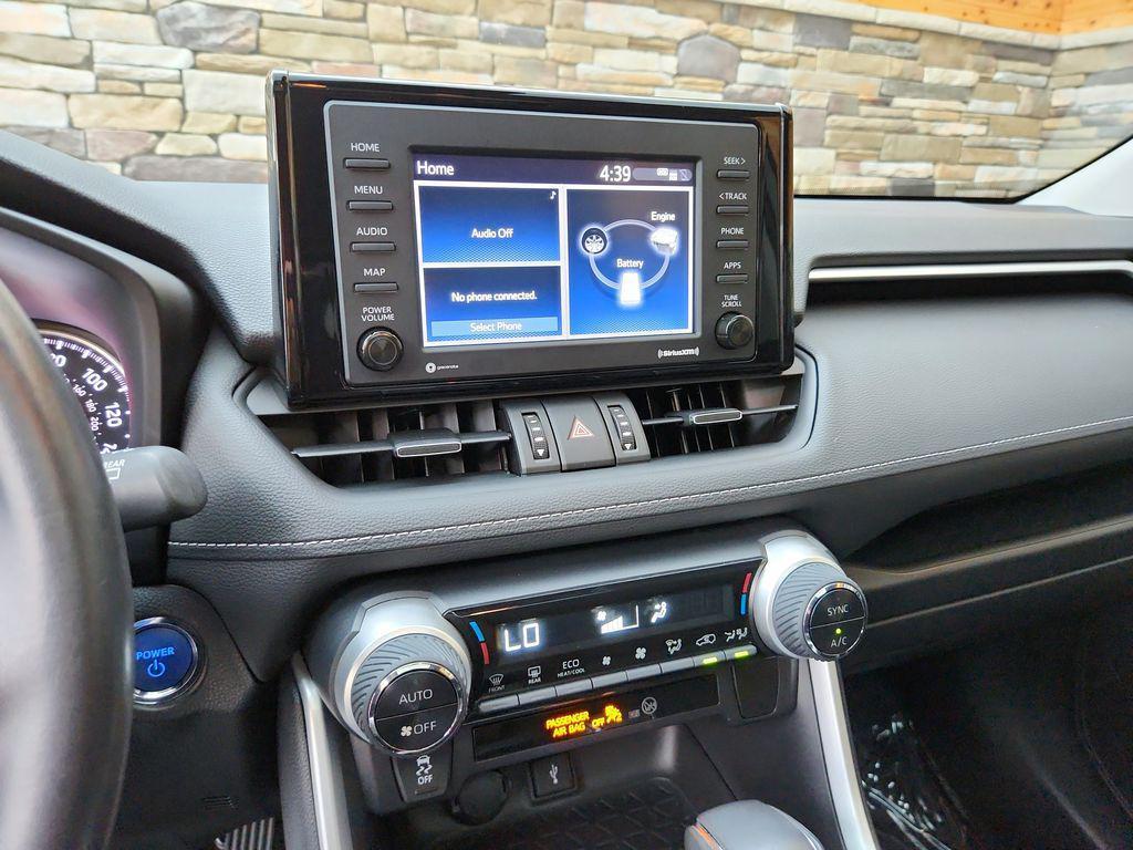 used 2021 Toyota RAV4 Hybrid car, priced at $34,199