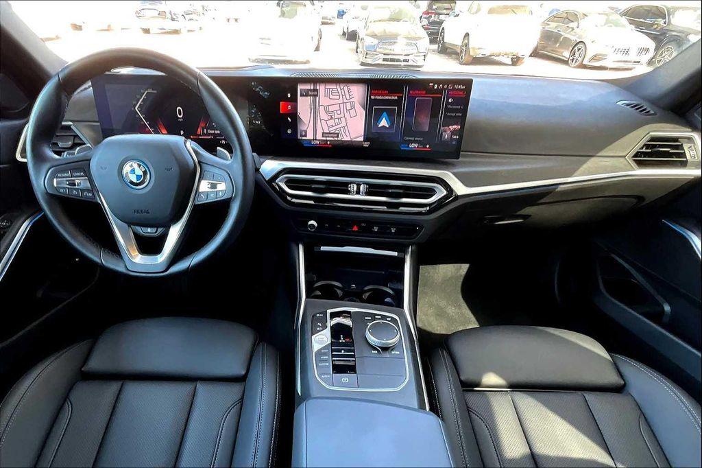 used 2023 BMW 330e car, priced at $38,482