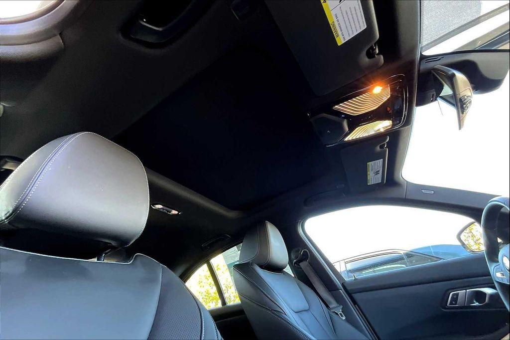 used 2023 BMW 330e car, priced at $38,482