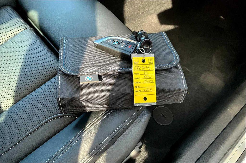 used 2023 BMW 330e car, priced at $38,482