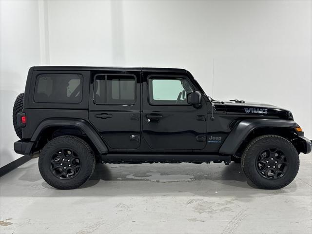 used 2023 Jeep Wrangler 4xe car, priced at $29,921