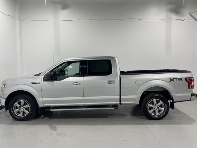 used 2018 Ford F-150 car, priced at $26,749