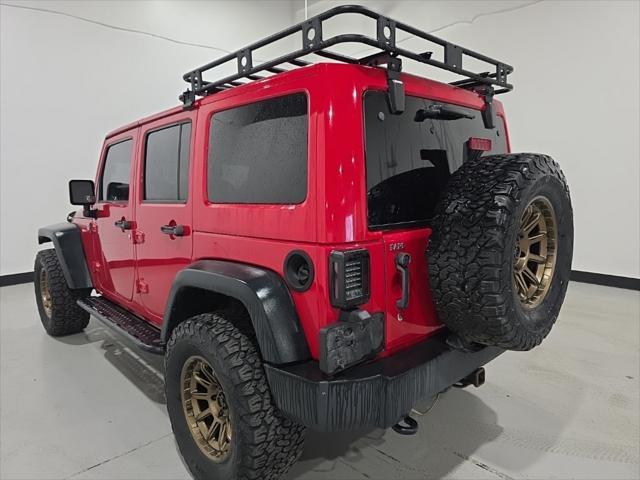 used 2014 Jeep Wrangler Unlimited car, priced at $21,991