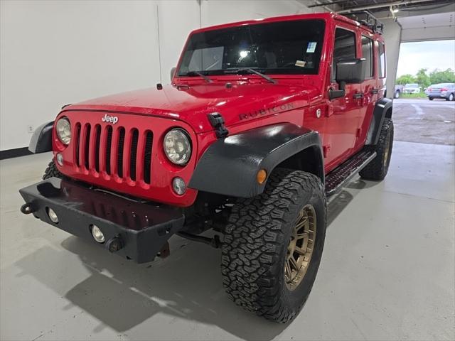 used 2014 Jeep Wrangler Unlimited car, priced at $21,991