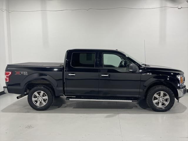 used 2018 Ford F-150 car, priced at $27,758