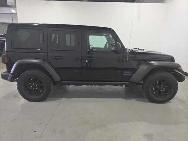 used 2023 Jeep Wrangler 4xe car, priced at $29,354