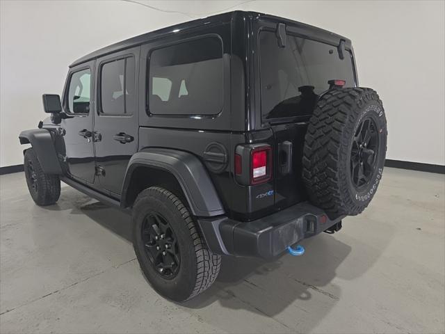 used 2023 Jeep Wrangler 4xe car, priced at $29,354
