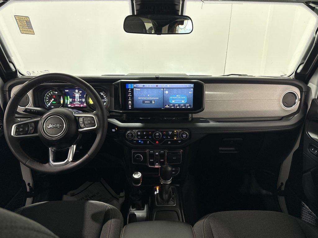 used 2024 Jeep Wrangler 4xe car, priced at $36,942
