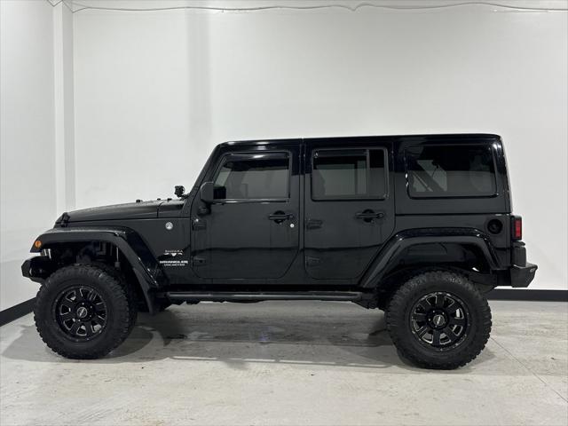 used 2016 Jeep Wrangler Unlimited car, priced at $21,580