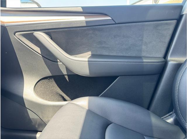 used 2023 Tesla Model Y car, priced at $28,995