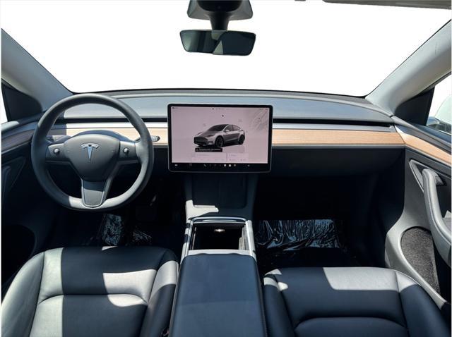 used 2023 Tesla Model Y car, priced at $28,995