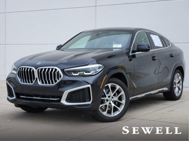 used 2023 BMW X6 car, priced at $63,897