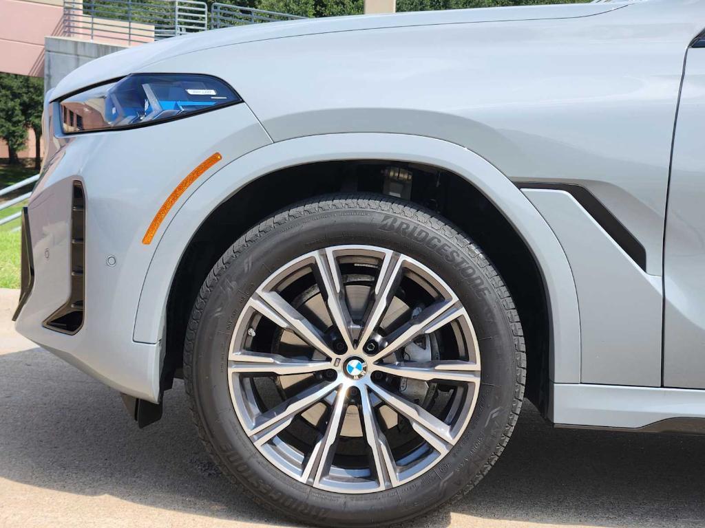 used 2025 BMW X6 car, priced at $78,990