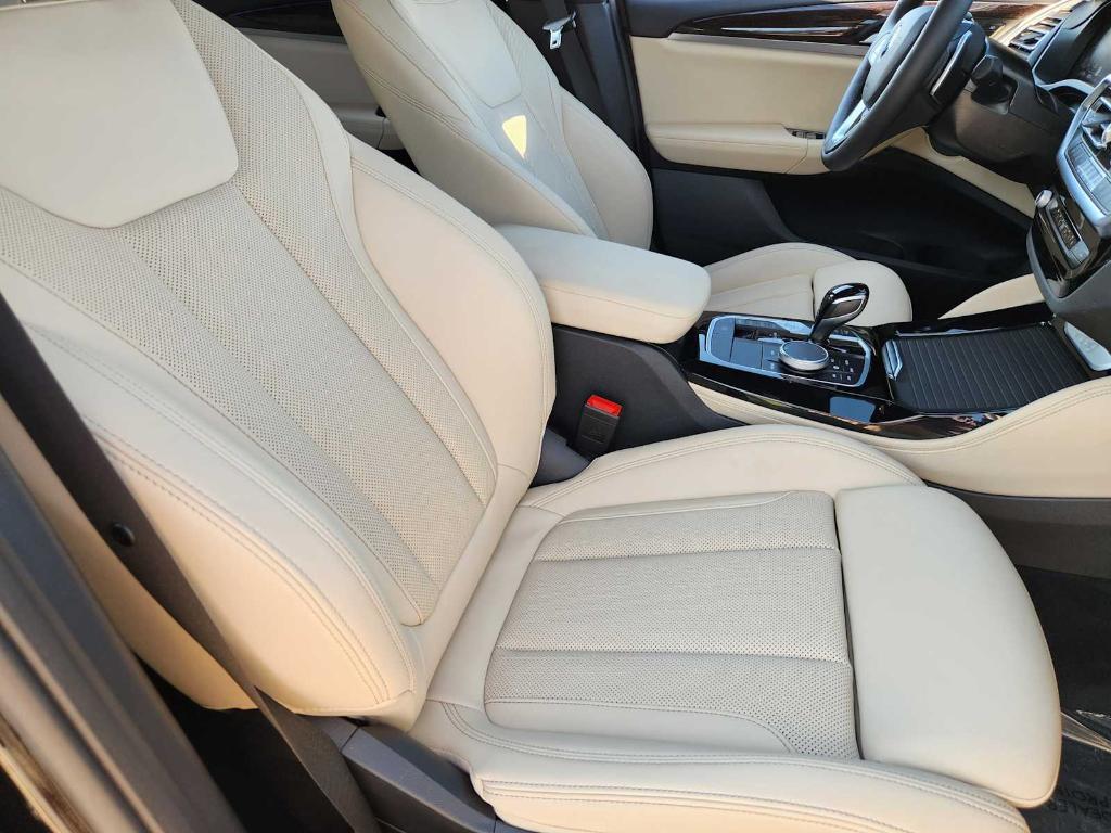used 2025 BMW X4 car, priced at $52,998