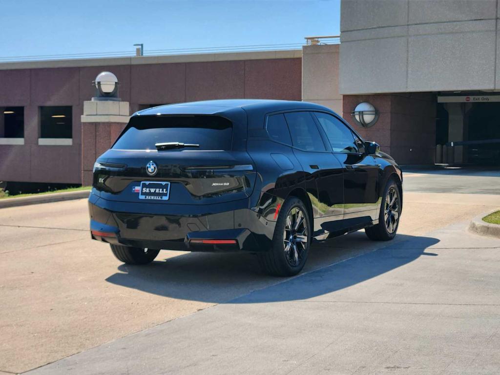 used 2024 BMW iX car, priced at $54,990